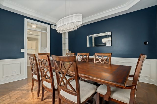 1032 South Spring Avenue La Grange, IL 60525 - Photo 8 of 44 a dining room with furniture and window