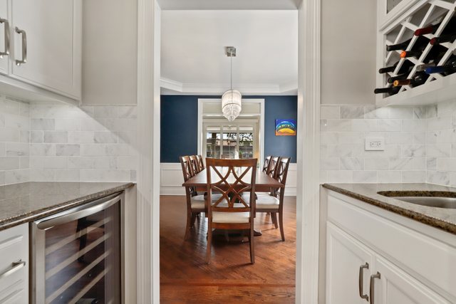 1032 South Spring Avenue La Grange, IL 60525 - Photo 9 of 44 a dining room with furniture and window