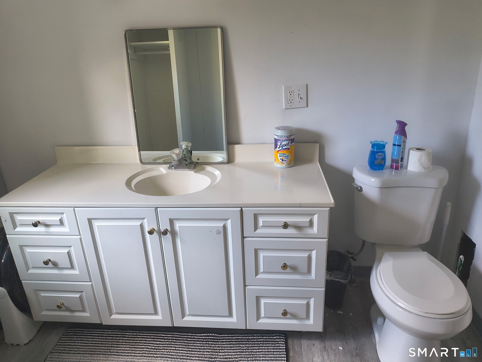 1489 Georges Hill Road Southbury, CT 06488 - Photo 17 of 21 a bathroom with a toilet sink and mirror