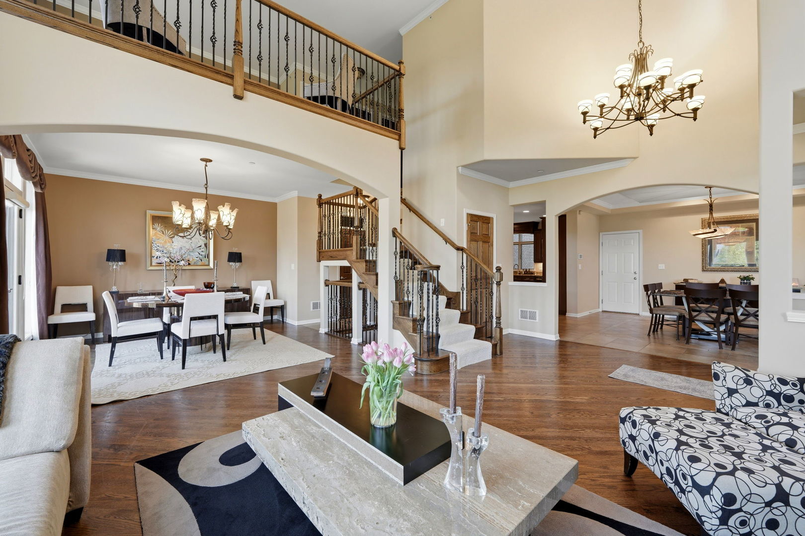 1406 Rue Paris Place Inverness, IL 60067 - Photo 6 of 35 a living room with furniture and a chandelier