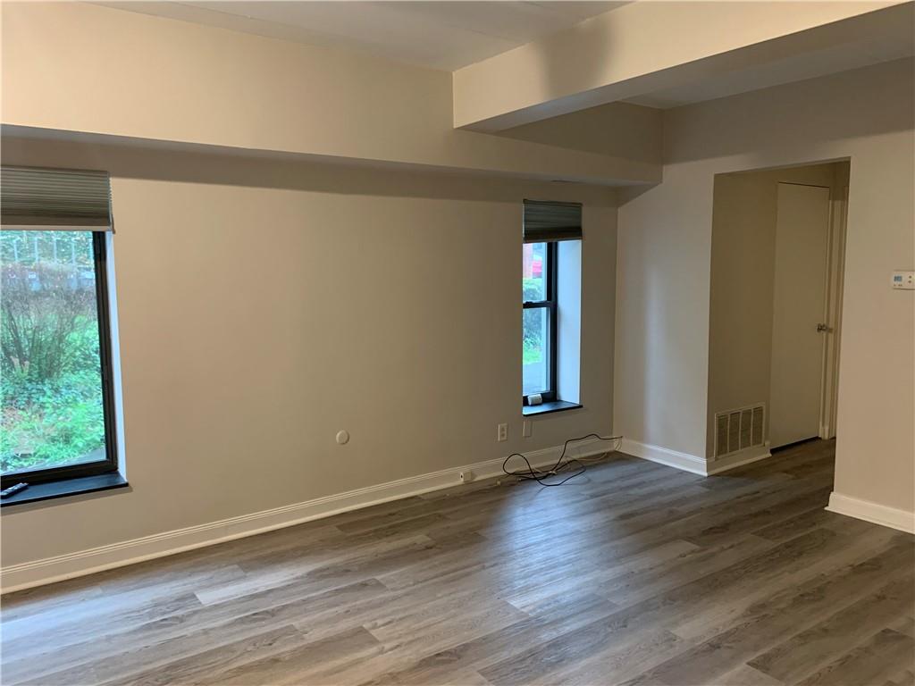 5708 Walnut Street, Unit G1 Pittsburgh, PA 15232 - Photo 3 of 19 Large Windows in Main Living / Dining Area