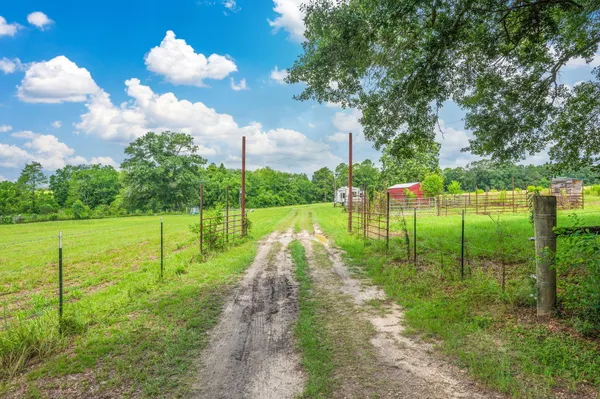 a view of a lake with a big yard