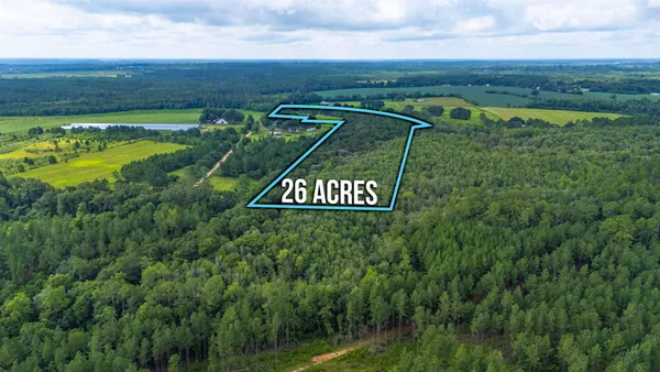 a view of a back yard with an outdoor space