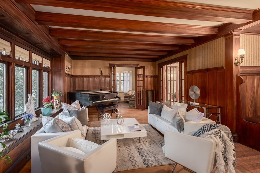 67 Crowninshield Road Brookline, MA 02446 - Photo 3 of 23 a living room with furniture and a large window