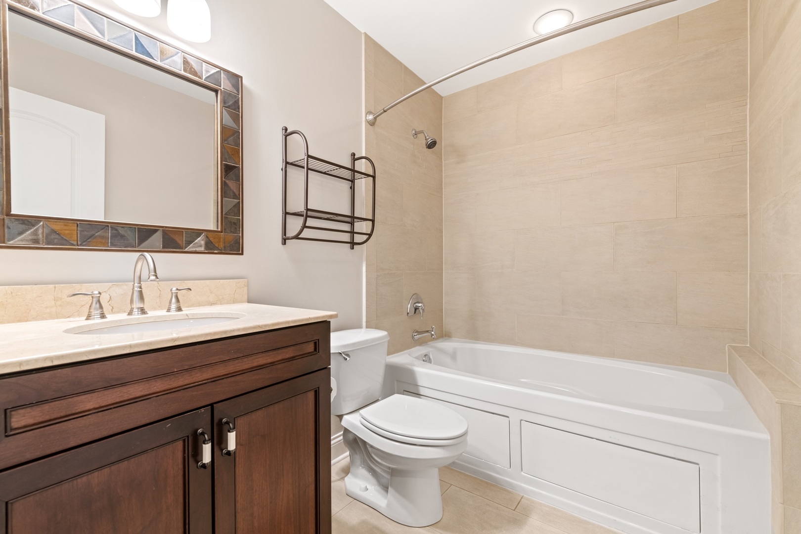 2620 North Racine Avenue, Unit 2S Chicago, IL 60614 - Photo 9 of 14 a bathroom with a sink a toilet and shower