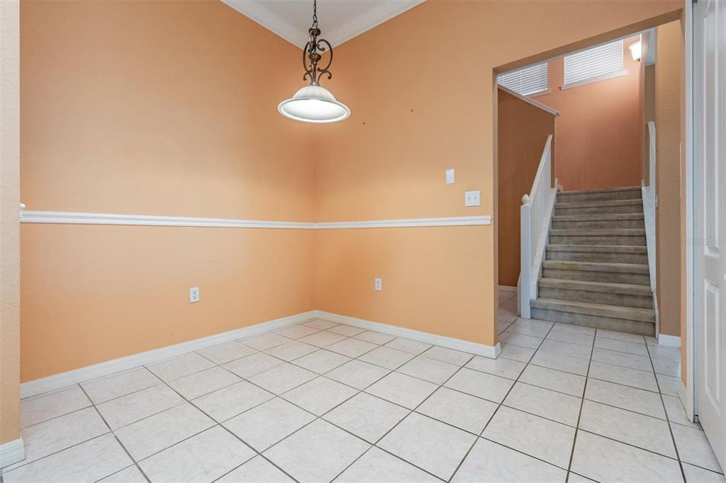 3494 Primrose Way Palm Harbor, FL 34683 - Photo 17 of 68 a view of an empty room with wooden floor