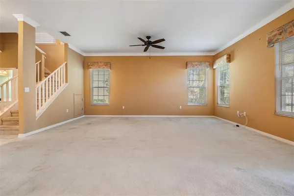 a view of a hallway with staircase