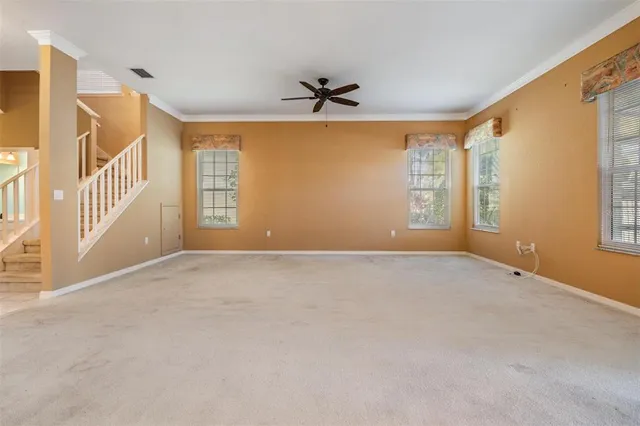 a view of a hallway with staircase