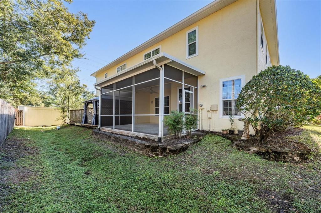 3494 Primrose Way Palm Harbor, FL 34683 - Photo 26 of 68 a view of a house with backyard and garden