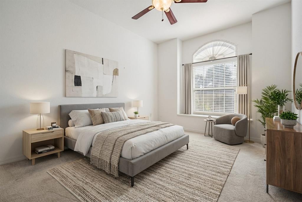 3494 Primrose Way Palm Harbor, FL 34683 - Photo 41 of 68 a bedroom with a bed and a couch