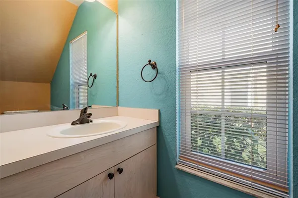 a bathroom with a toilet and a sink