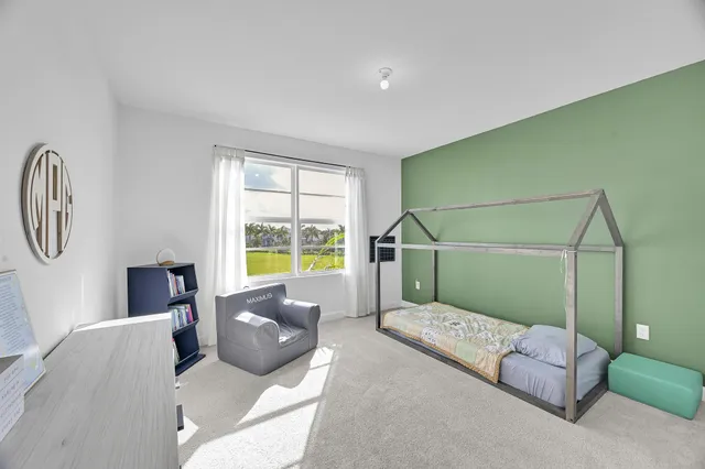 a bathroom with a mirror and a shower