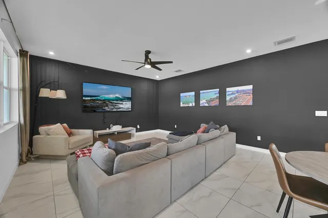 a bedroom with furniture and window