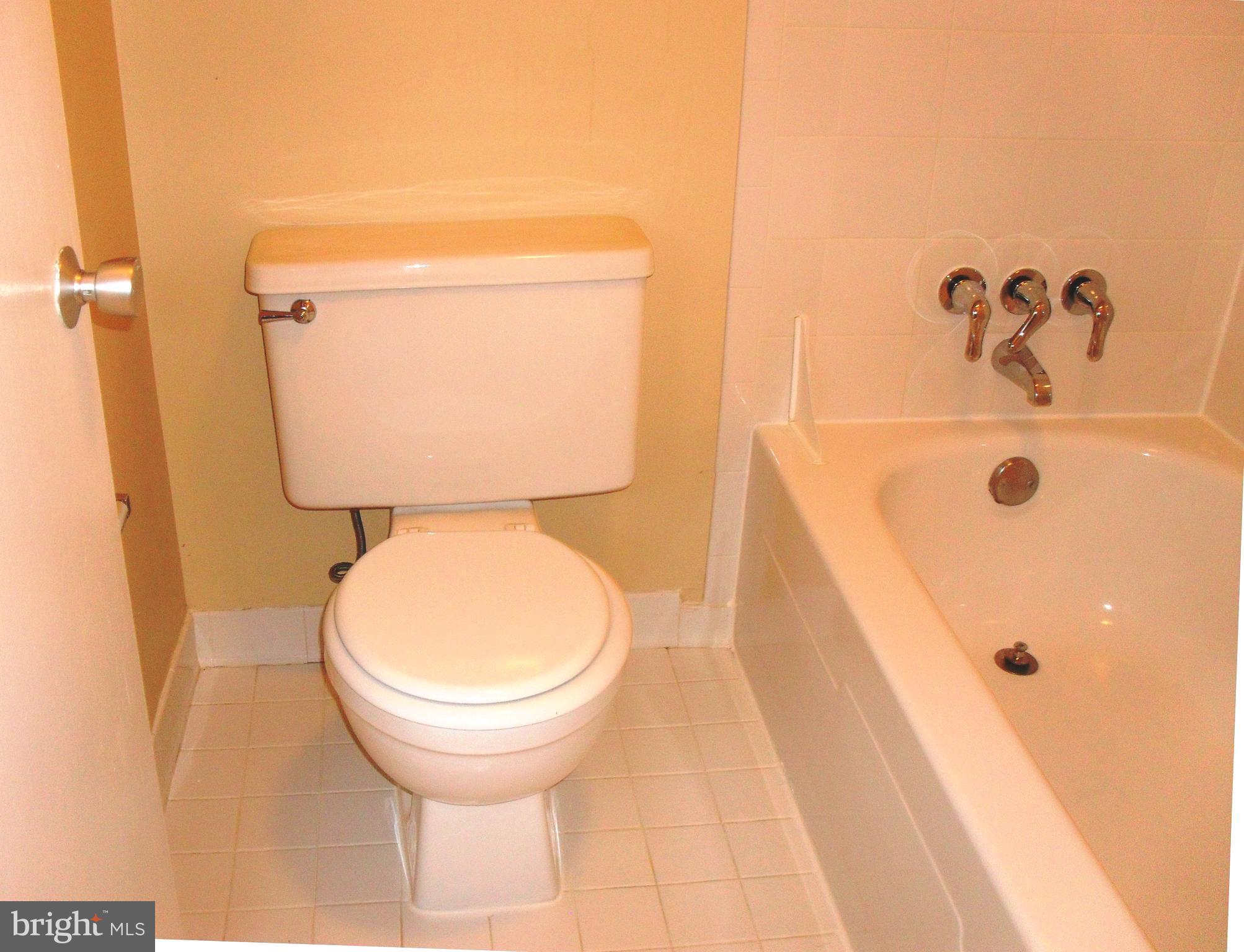 1659 Parkcrest Circle, Unit C Reston, VA 20190 - Photo 13 of 17 Crip, new white tile, fresh paint in bath