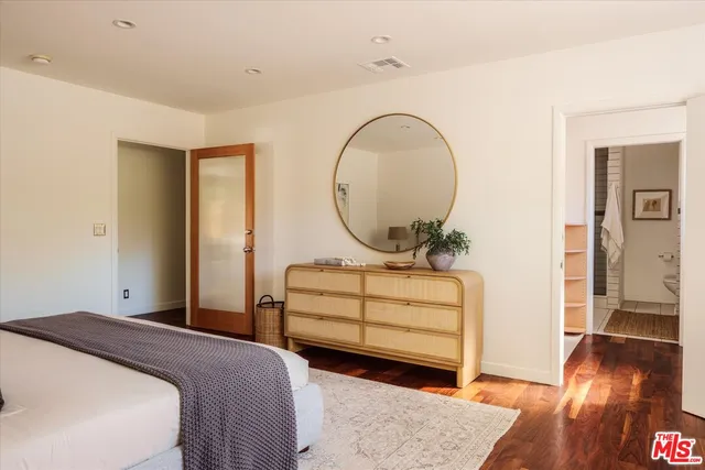 a room with closet and racks