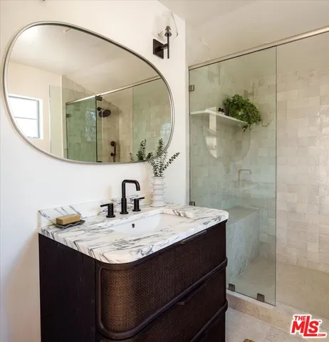 a outdoor dining space with furniture and a potted plant