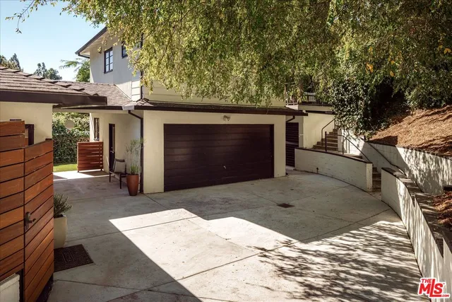a view of house with yard