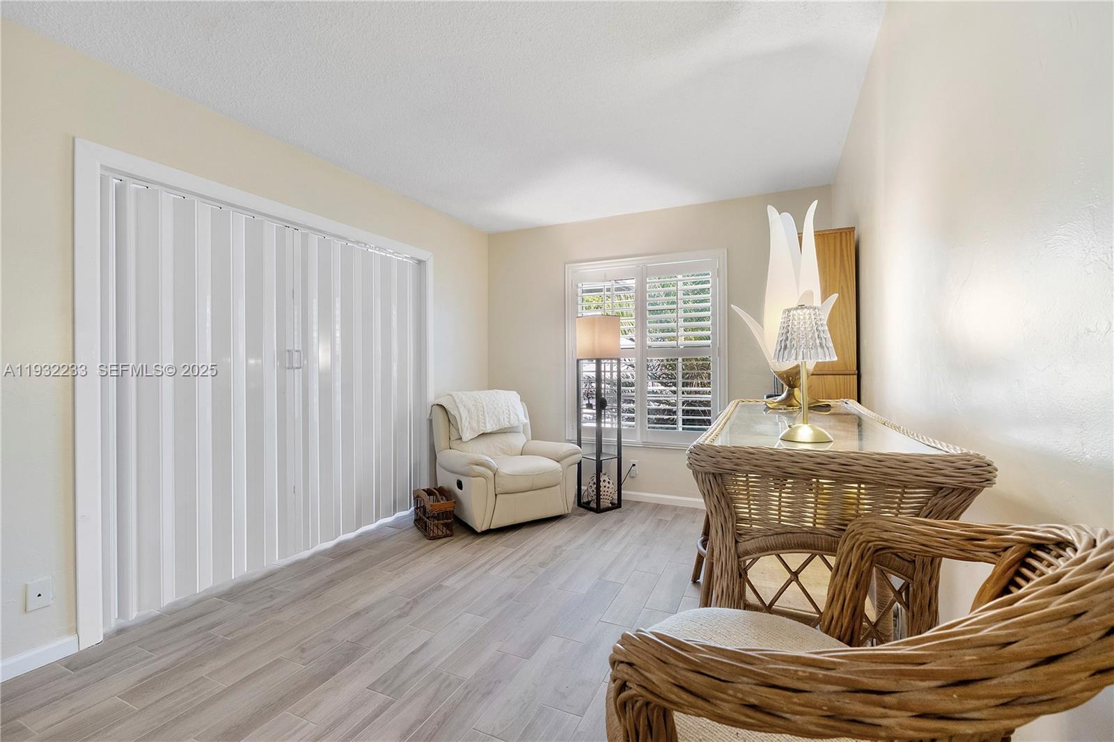 6750 Northeast 21st Road, Unit 124 Fort Lauderdale, FL 33308 - Photo 30 of 50 a bed room with furniture and a window