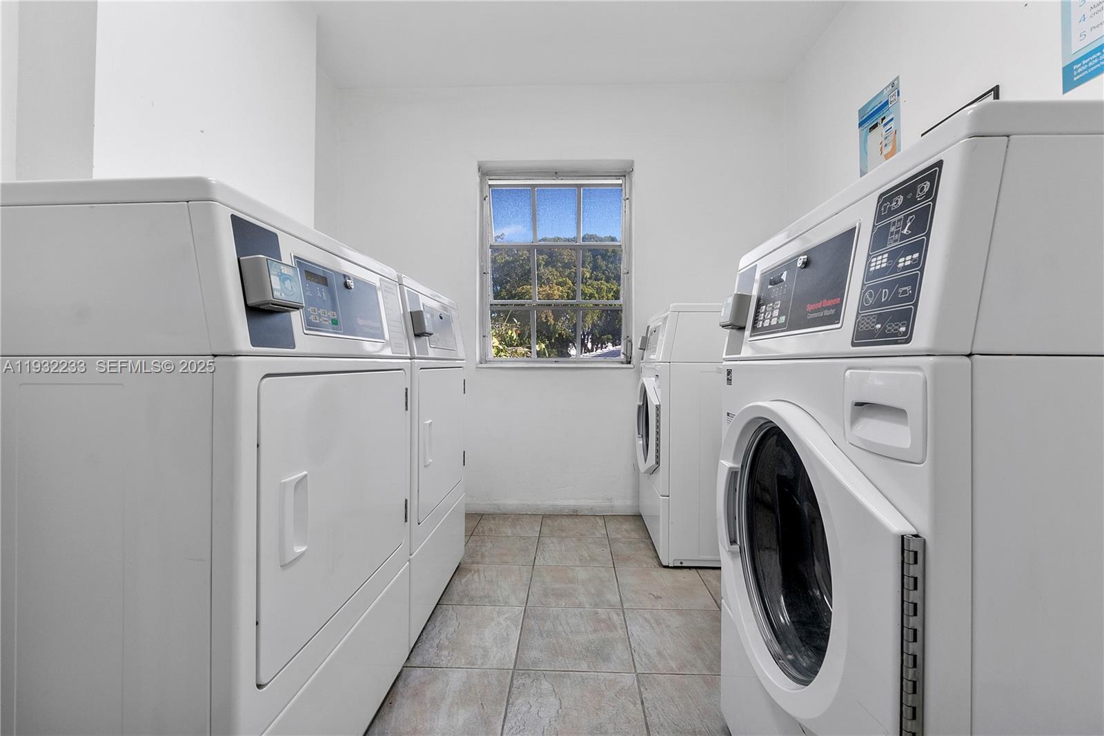 6750 Northeast 21st Road, Unit 124 Fort Lauderdale, FL 33308 - Photo 32 of 50 a utility room with dryer and washer