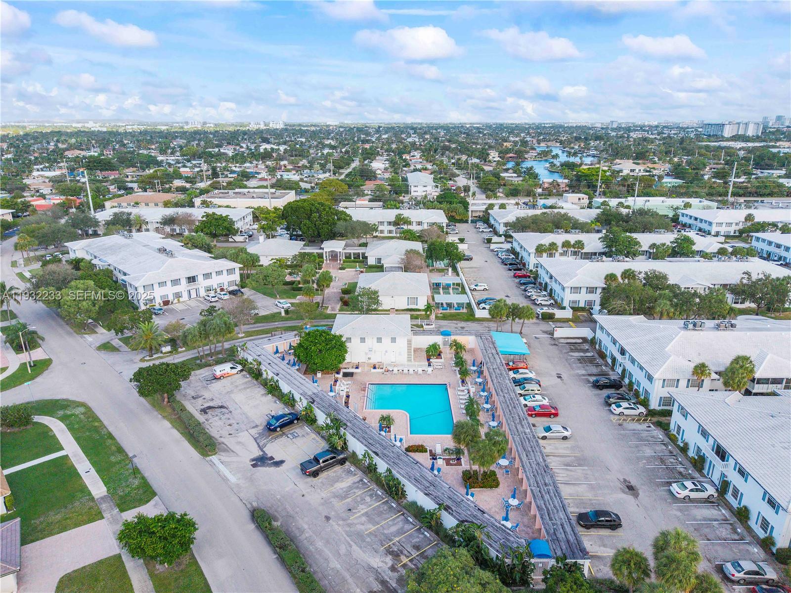 6750 Northeast 21st Road, Unit 124 Fort Lauderdale, FL 33308 - Photo 34 of 50 an aerial view of residential houses with outdoor space