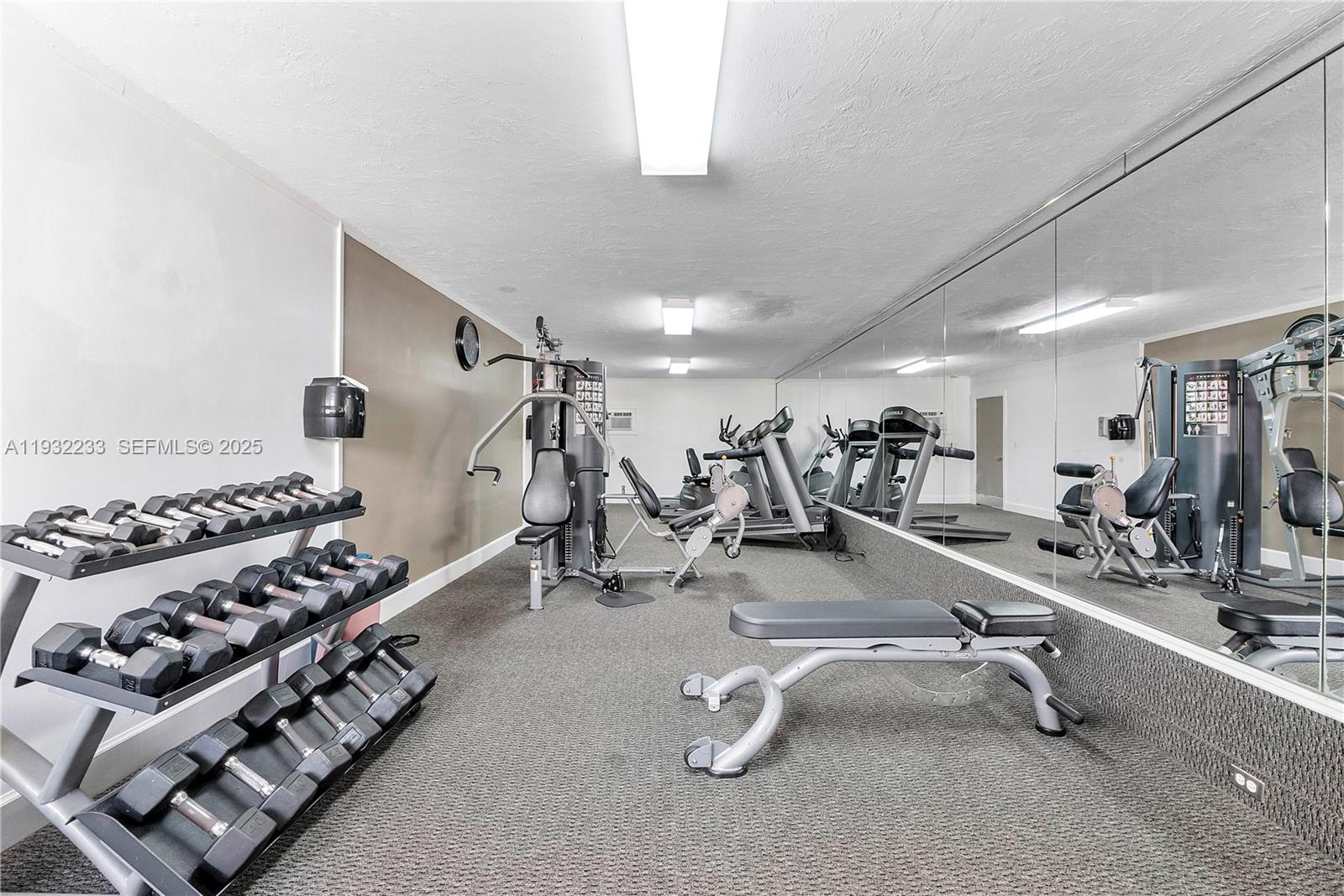 6750 Northeast 21st Road, Unit 124 Fort Lauderdale, FL 33308 - Photo 43 of 50 a view of a room with gym equipment