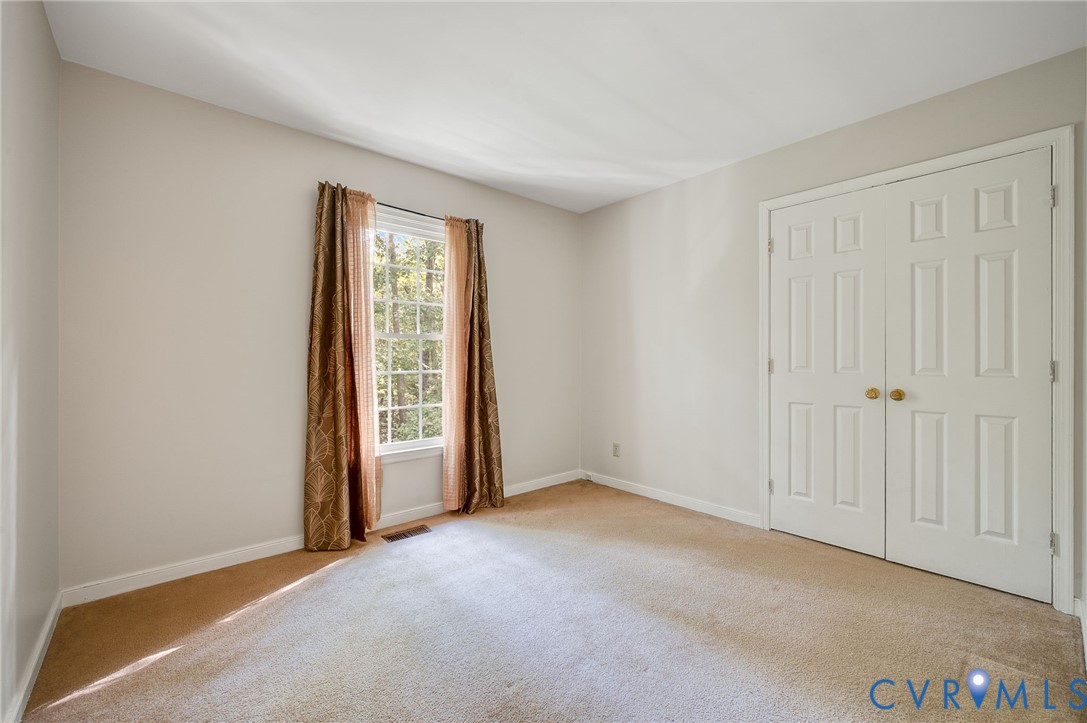 4820 Cedar Cliff Road Chester, VA 23831 - Photo 26 of 41 Carpeted flooring, neutral wall tones, large windo