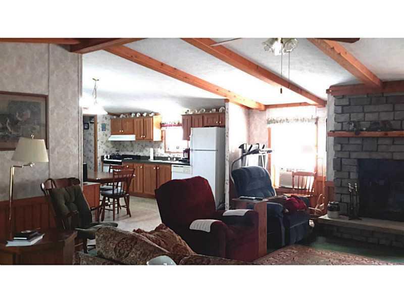 350 Transalpine Road Lincoln, ME 04457 - Photo 27 of 27 Living Room. Open floorplan with...