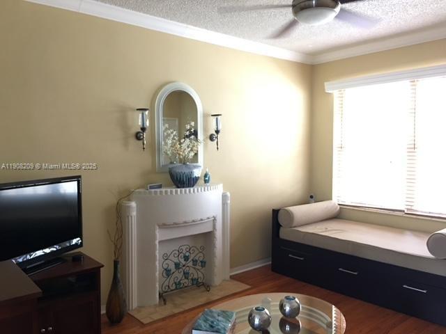 750 Euclid Avenue, Unit 8 Miami Beach, FL 33139 - Photo 3 of 8 a living room with furniture and a flat screen tv
