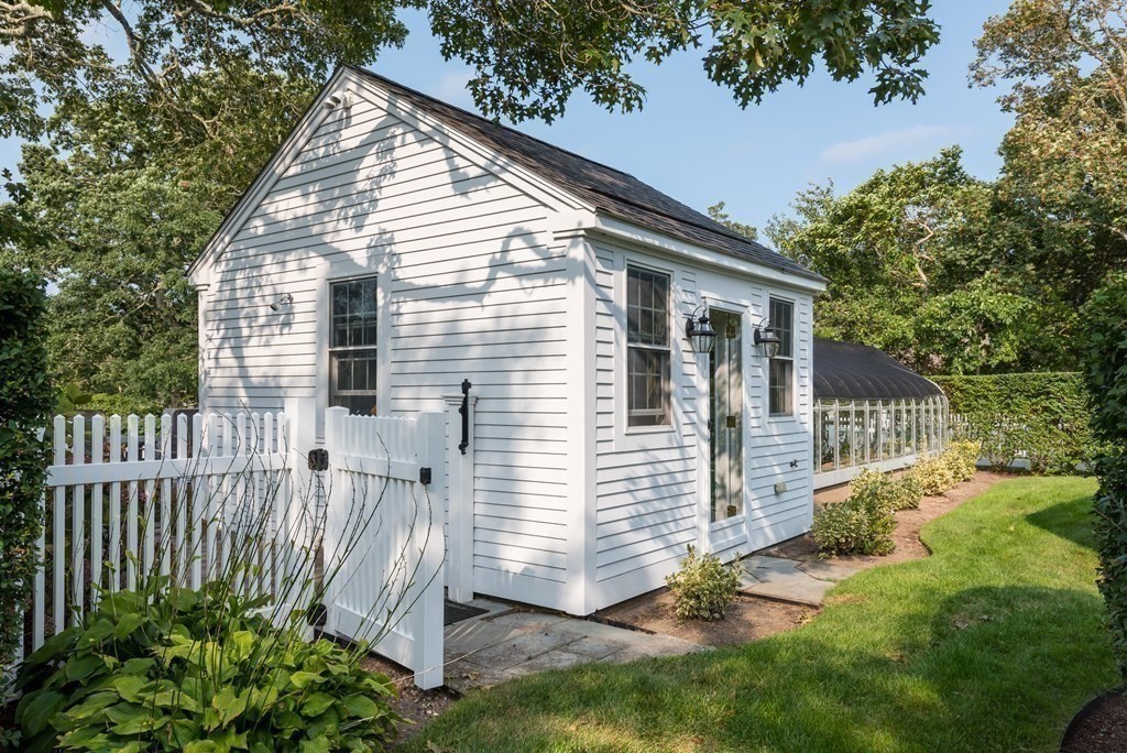 652 Route 28 Harwich, MA 02646 - Photo 7 of 24 a view of a house with backyard and a garden