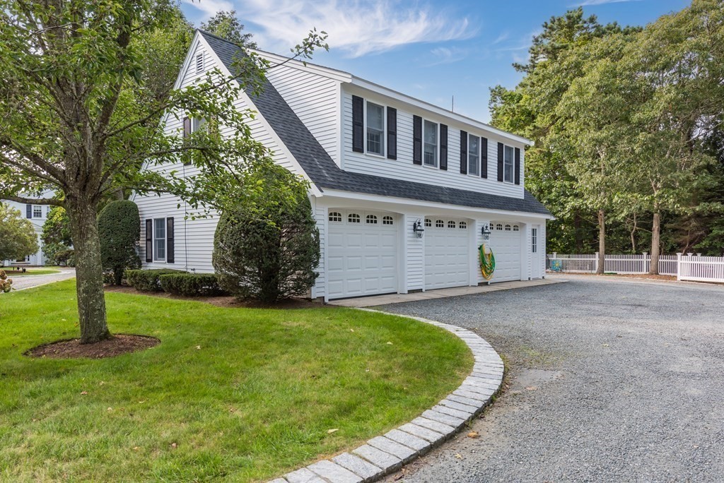 652 Route 28 Harwich, MA 02646 - Photo 9 of 24 front view of a house with a yard