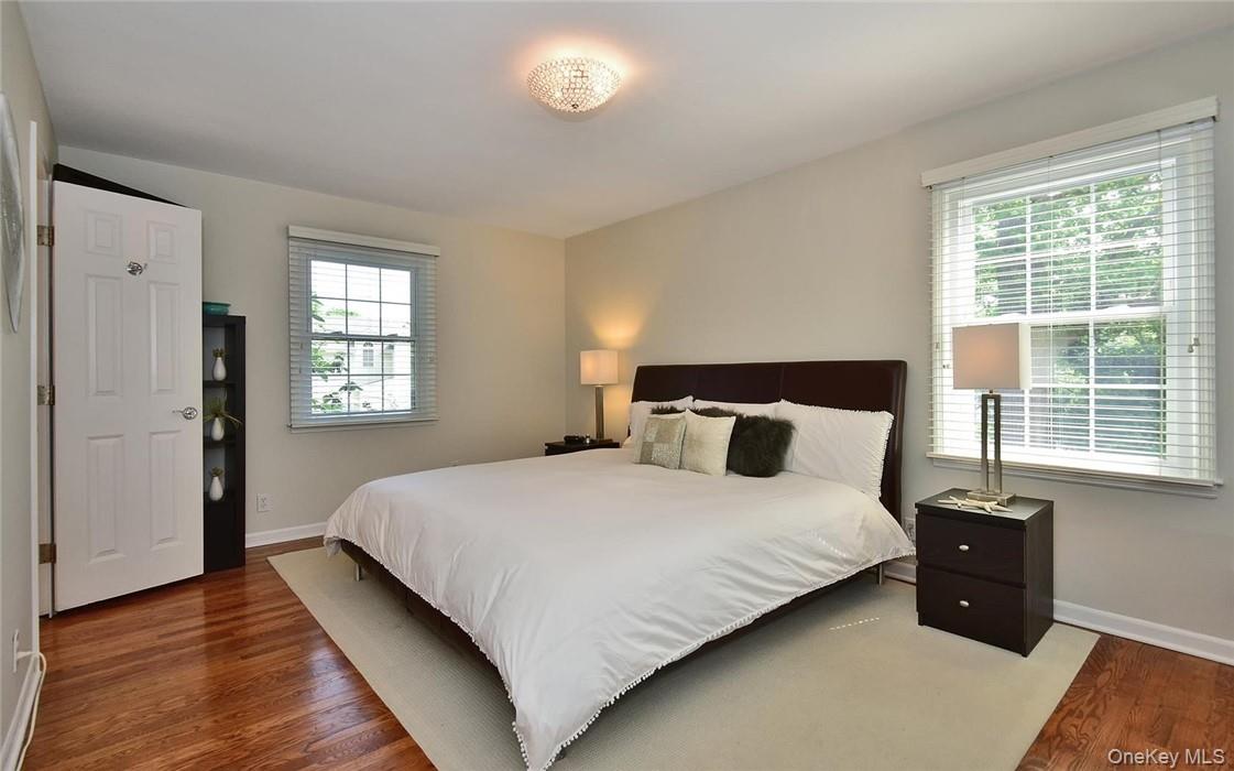 9 Franklin Avenue Rye, NY 10580 - Photo 15 of 35 a bedroom with a bed and a window