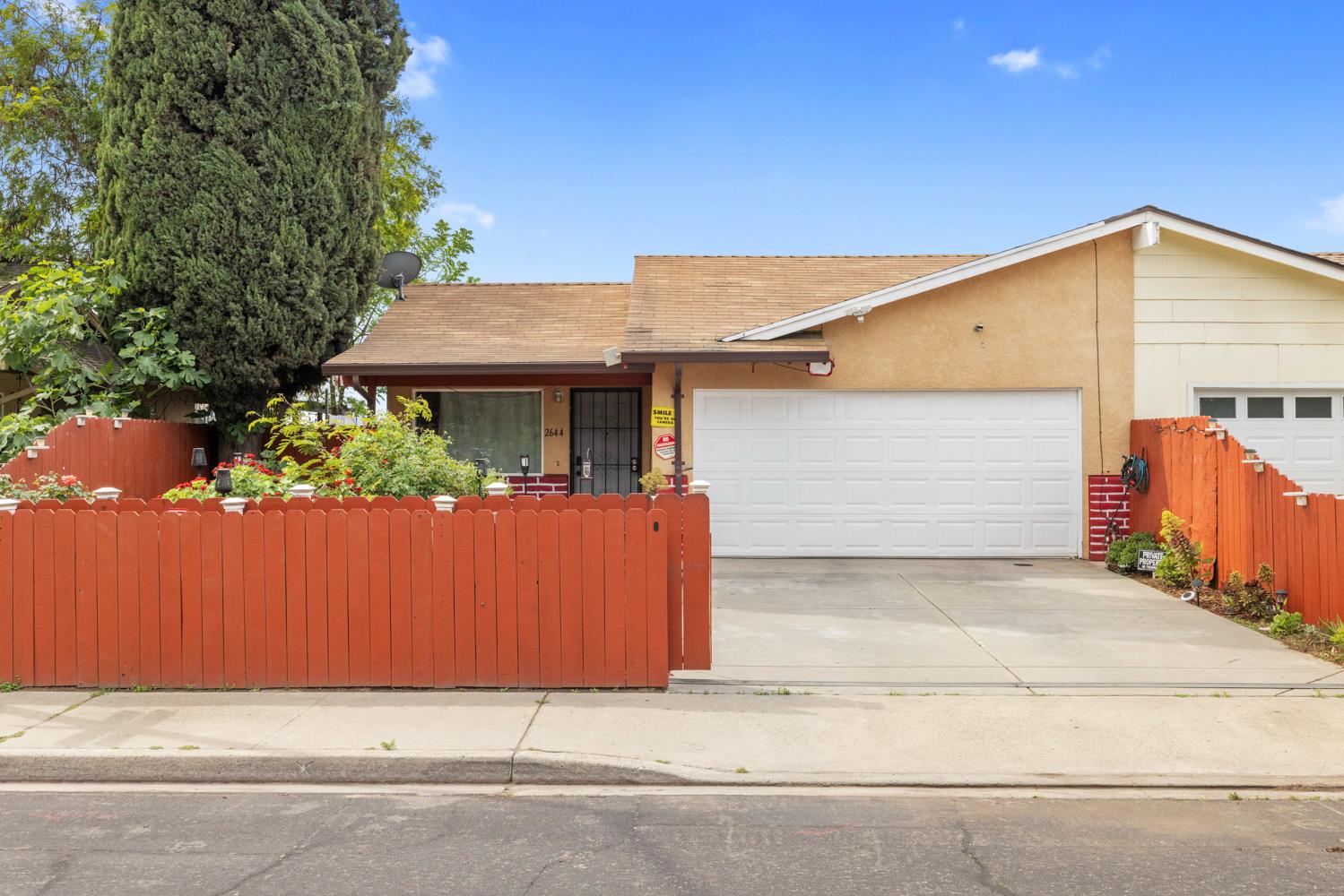 a view of a house with a garage