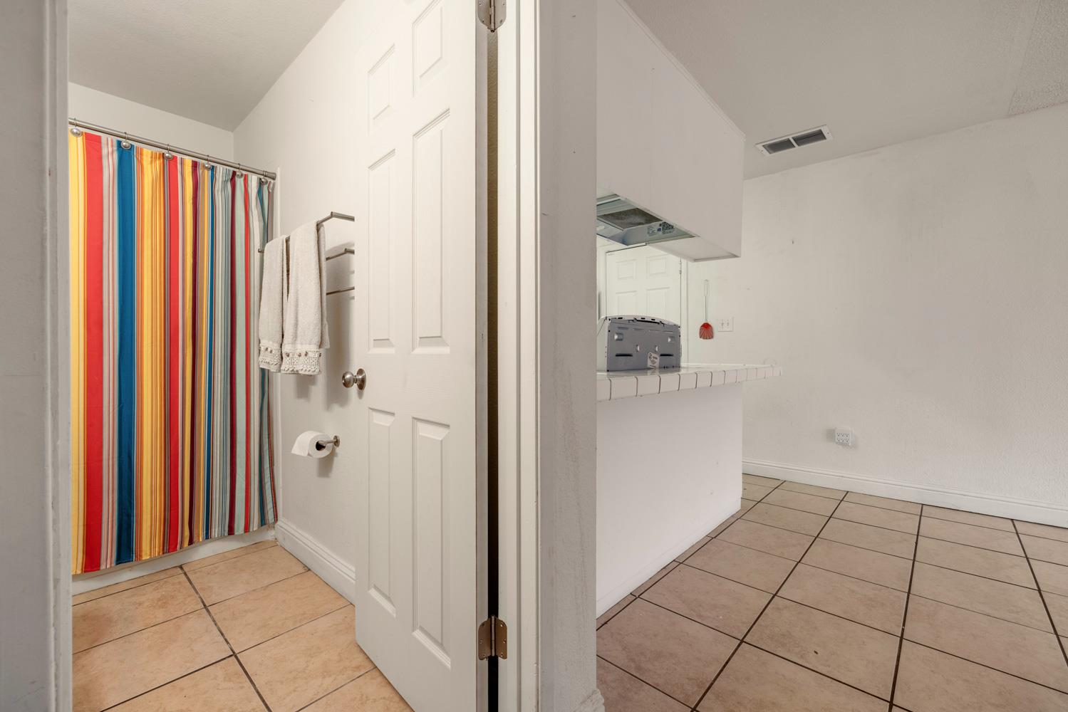 2644 San Ignacio Avenue Modesto, CA 95354 - Photo 13 of 32 a view of a bedroom from the hallway