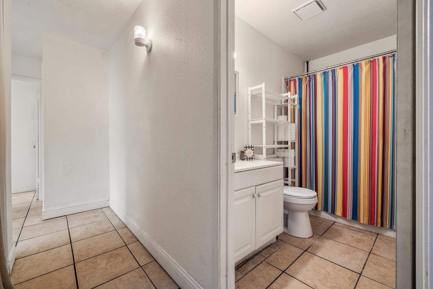 2644 San Ignacio Avenue Modesto, CA 95354 - Photo 15 of 32 a view of a bathroom with a sink and a toilet