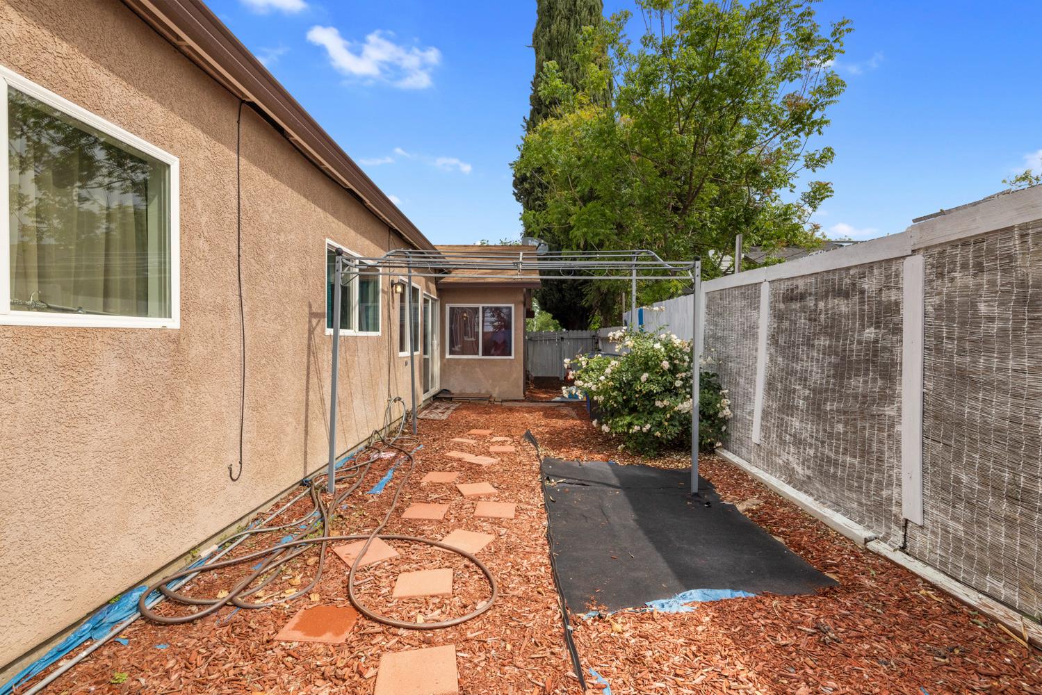 2644 San Ignacio Avenue Modesto, CA 95354 - Photo 24 of 32 a view of a house with a patio