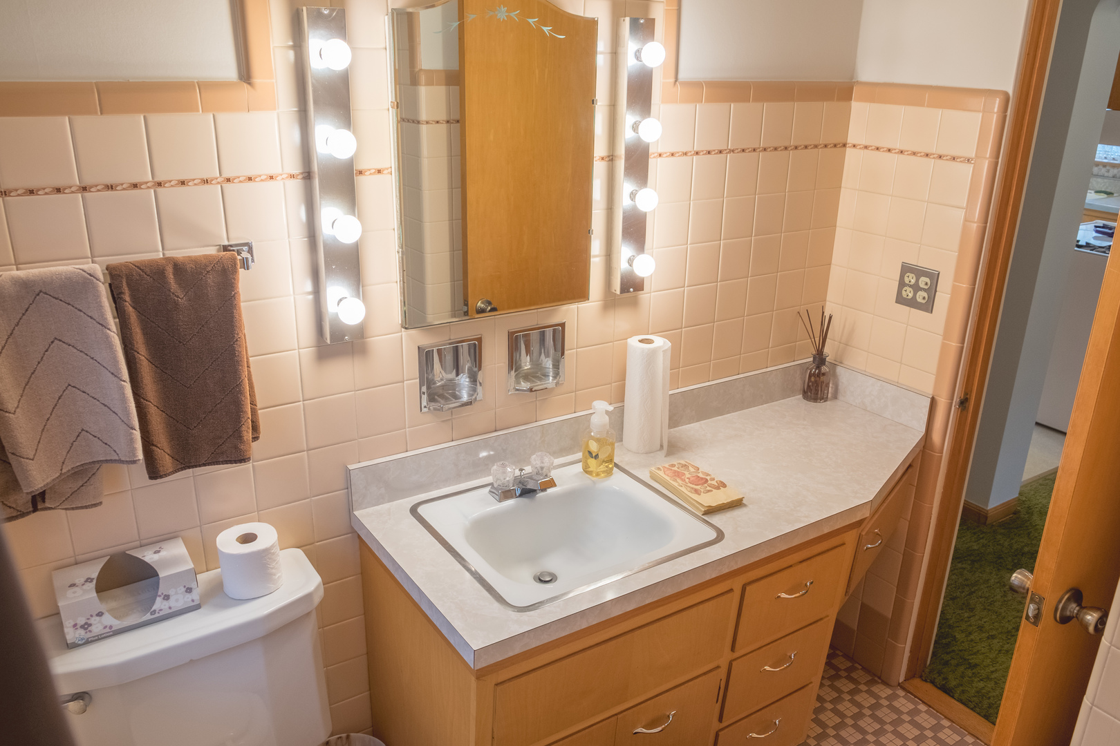 9016 West 23rd Street North Riverside, IL 60546 - Photo 21 of 49 a bathroom with a sink toilet and mirror