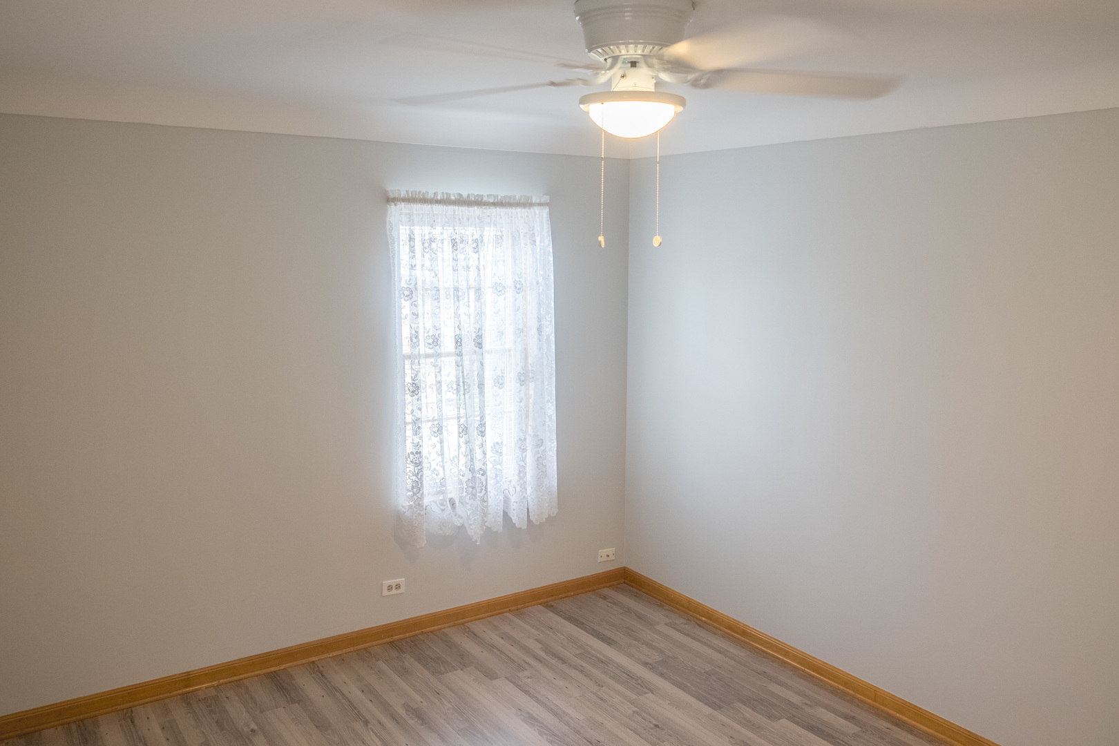 9016 West 23rd Street North Riverside, IL 60546 - Photo 24 of 49 wooden floor in an empty room with a window