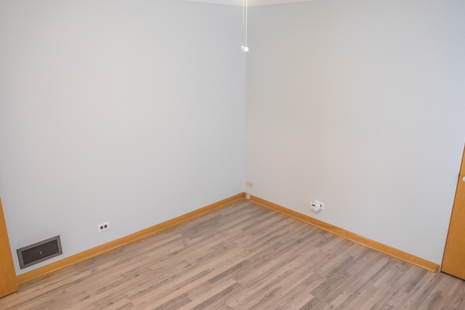 9016 West 23rd Street North Riverside, IL 60546 - Photo 27 of 49 a view of empty room with wooden floor