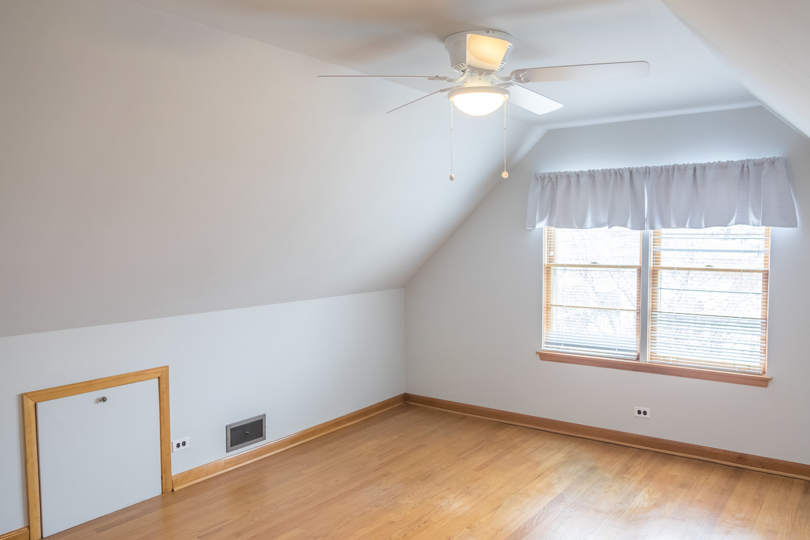9016 West 23rd Street North Riverside, IL 60546 - Photo 40 of 49 an empty room with windows and fan