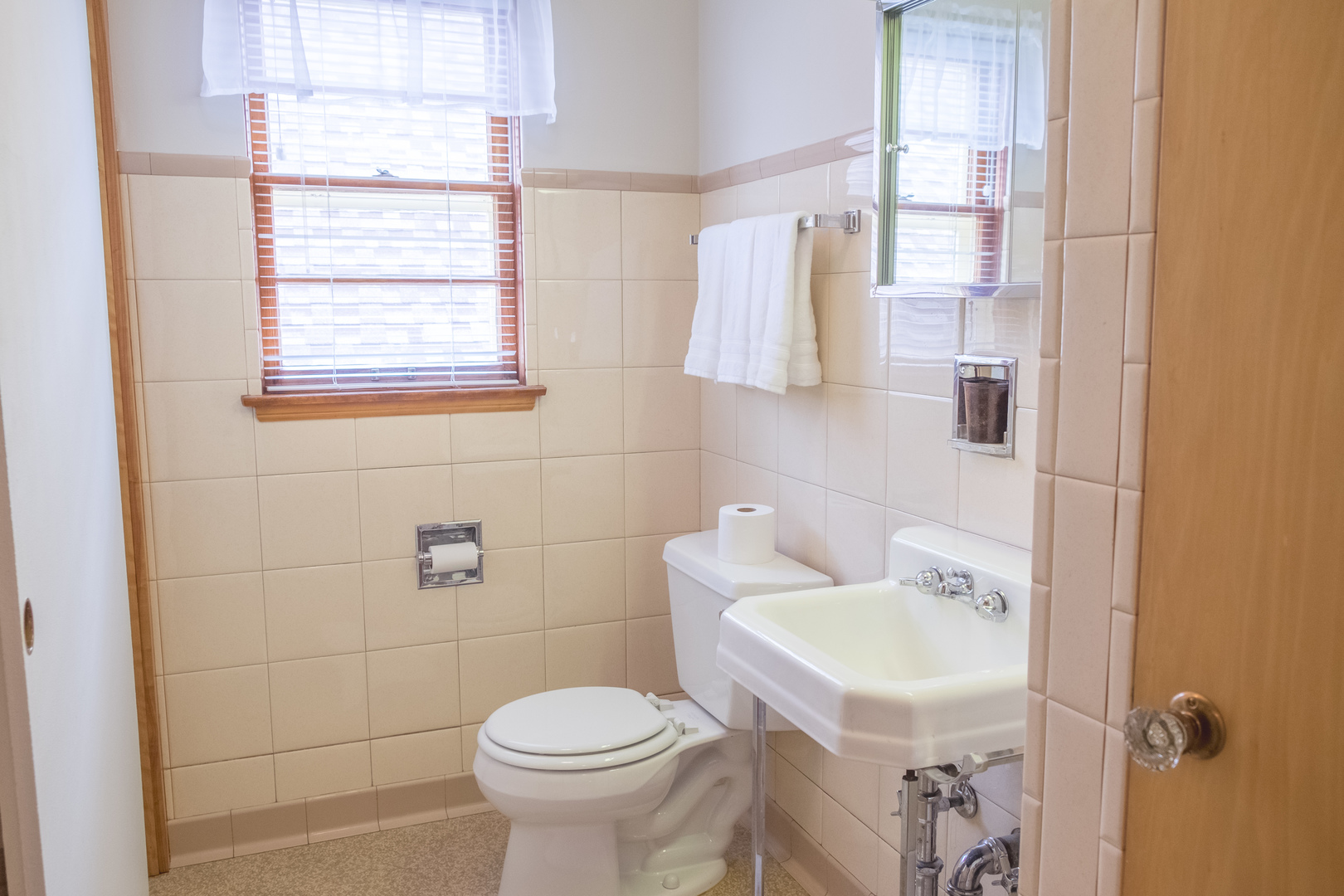 9016 West 23rd Street North Riverside, IL 60546 - Photo 41 of 49 a bathroom with a sink toilet and mirror