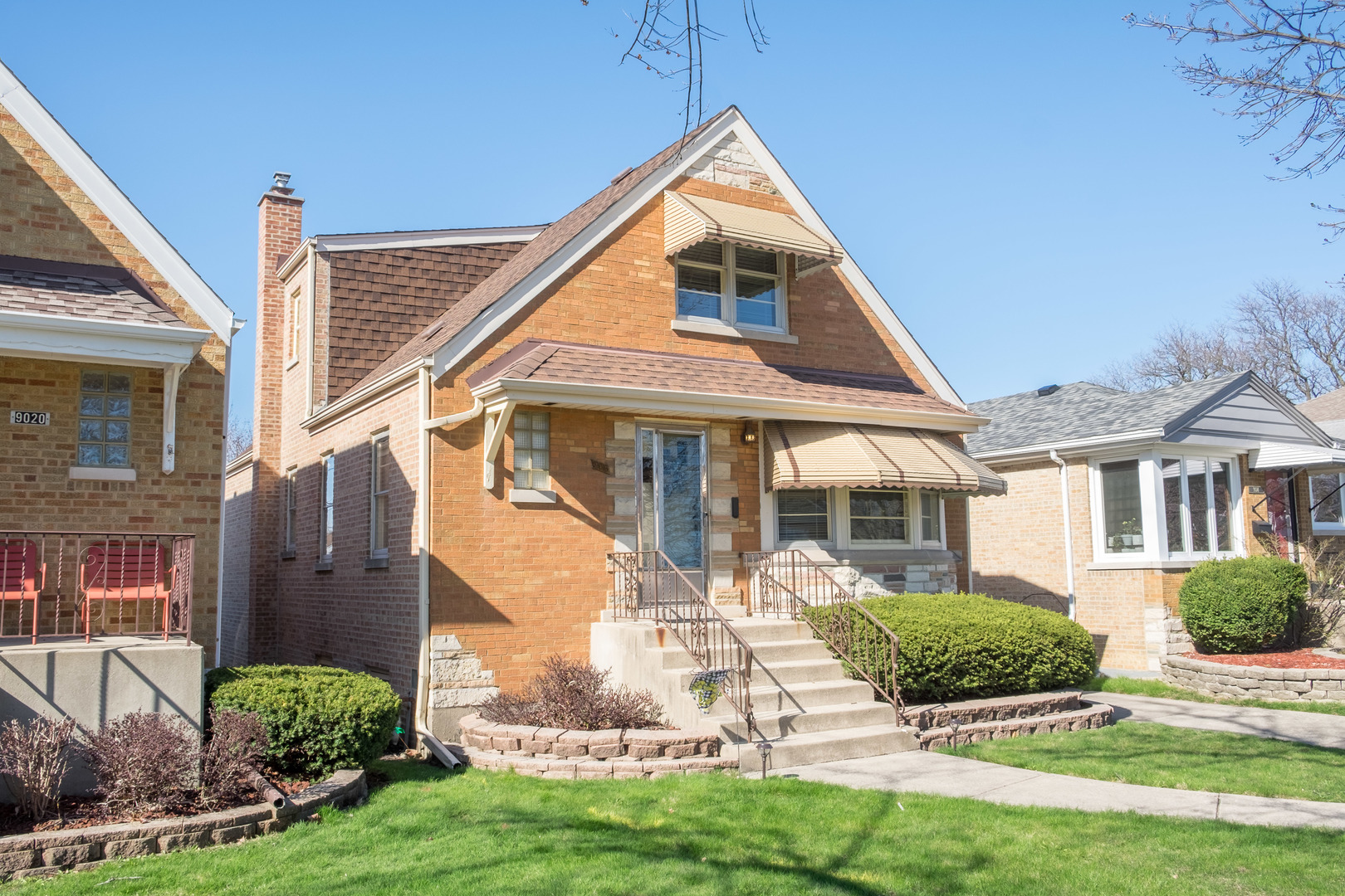 9016 West 23rd Street North Riverside, IL 60546 - Photo 5 of 49 a front view of a house with a yard