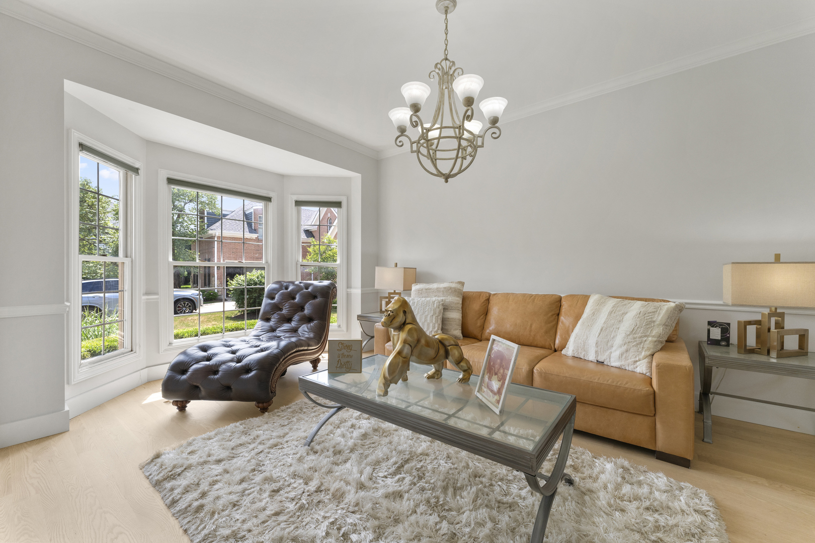 4308 Royal Windyne Court St. Charles, IL 60174 - Photo 16 of 47 a living room with furniture chandelier and a window