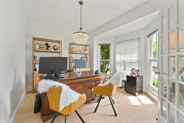 a bed room with a bed window and dresser