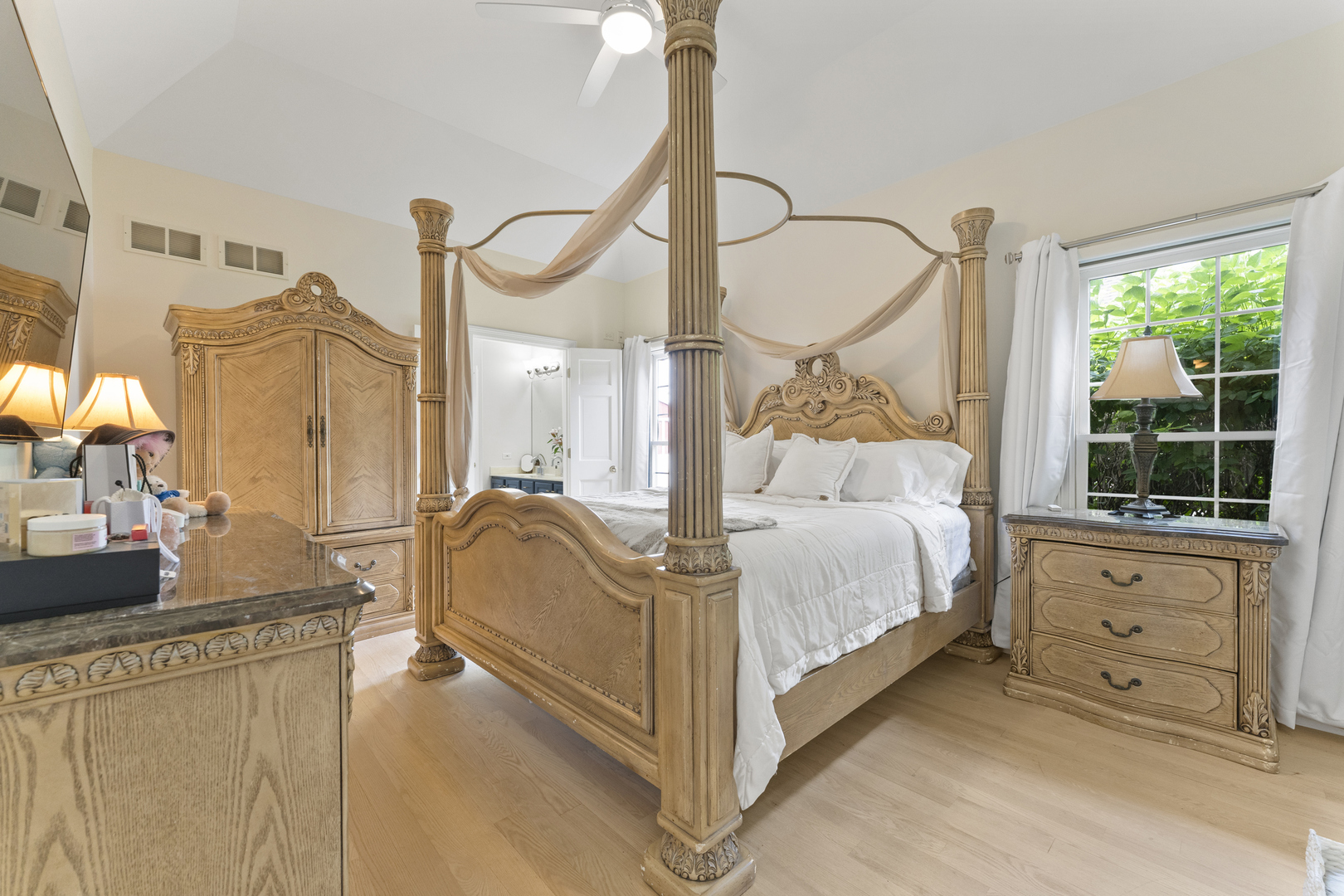 4308 Royal Windyne Court St. Charles, IL 60174 - Photo 19 of 47 a bed room with a bed window and dresser