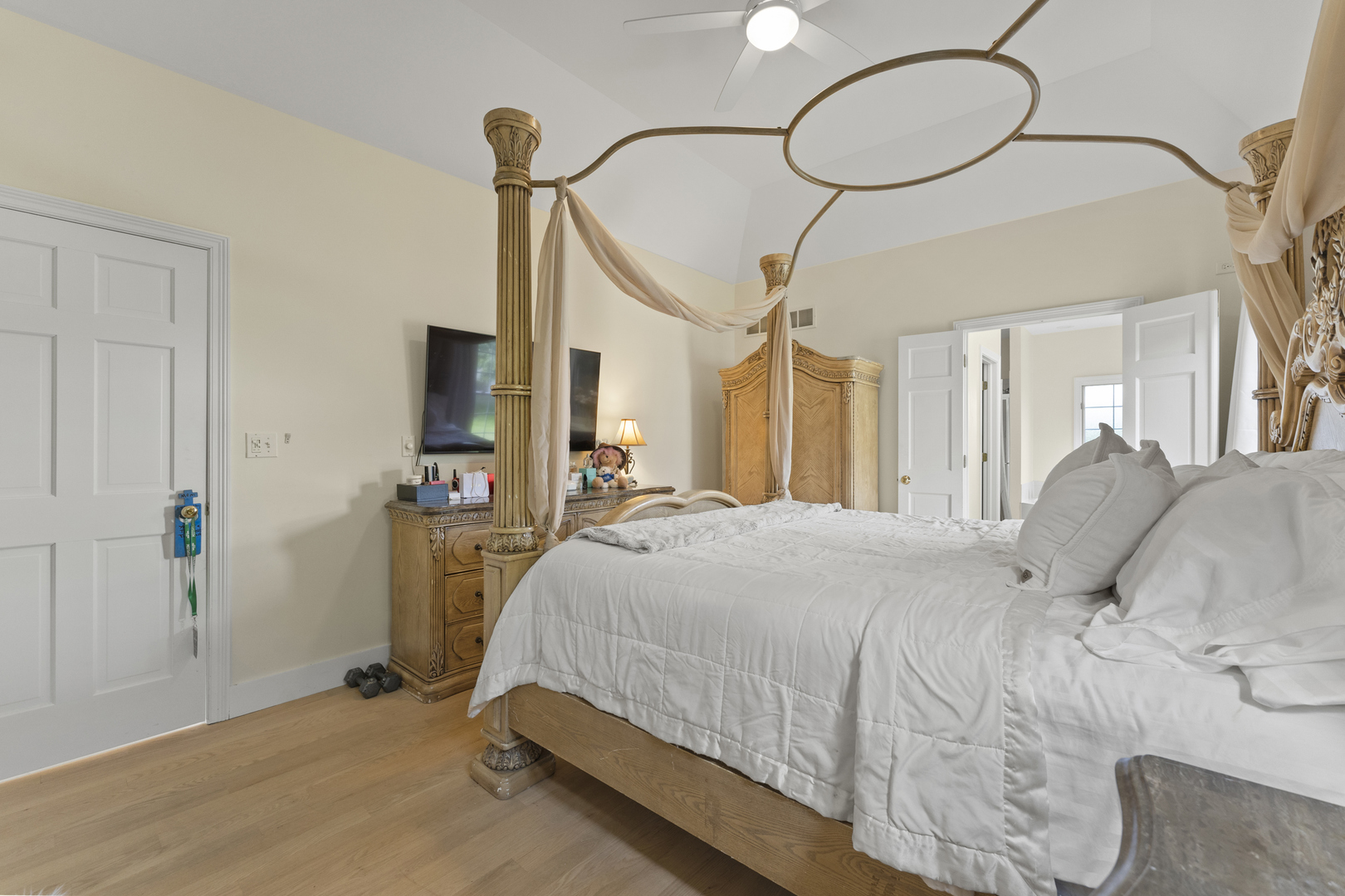 4308 Royal Windyne Court St. Charles, IL 60174 - Photo 20 of 47 a bed room with a bed and a chandelier