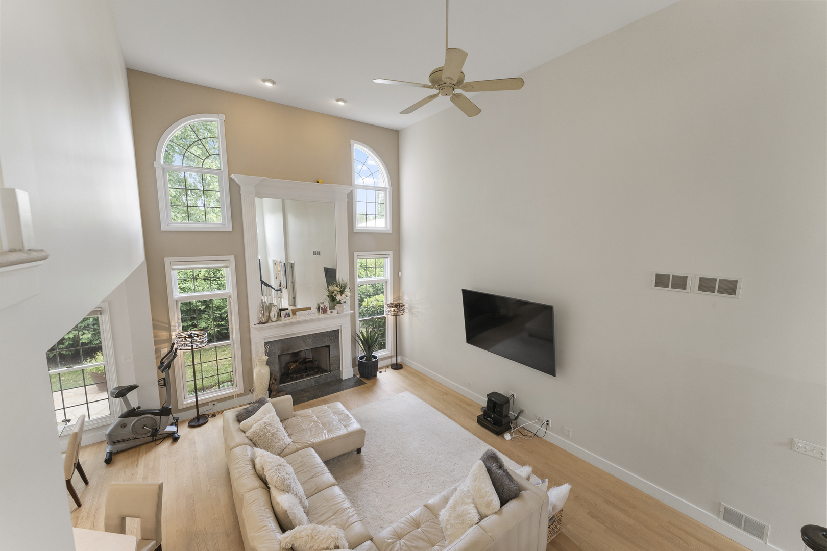 4308 Royal Windyne Court St. Charles, IL 60174 - Photo 25 of 47 a living room with furniture and a flat screen tv