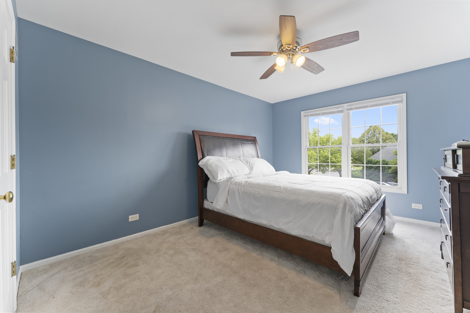 4308 Royal Windyne Court St. Charles, IL 60174 - Photo 32 of 47 a bedroom with a bed and window