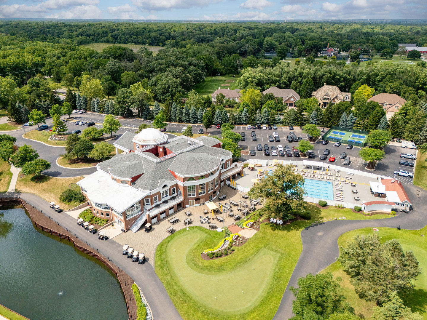 4308 Royal Windyne Court St. Charles, IL 60174 - Photo 44 of 47 an aerial view of a house with swimming pool and lake view