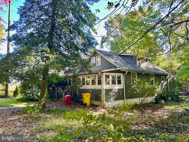 2017 Bay Road Pasadena, MD 21122 - Photo 2 of 5 a view of a house with a yard and potted plants