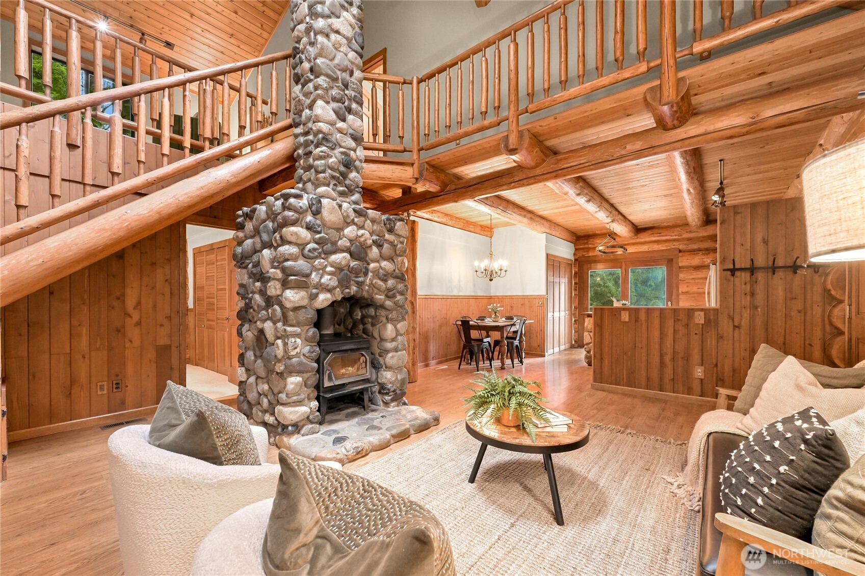 498 Summerland Road Bellingham, WA 98229 - Photo 11 of 40 a living room with furniture and a fireplace